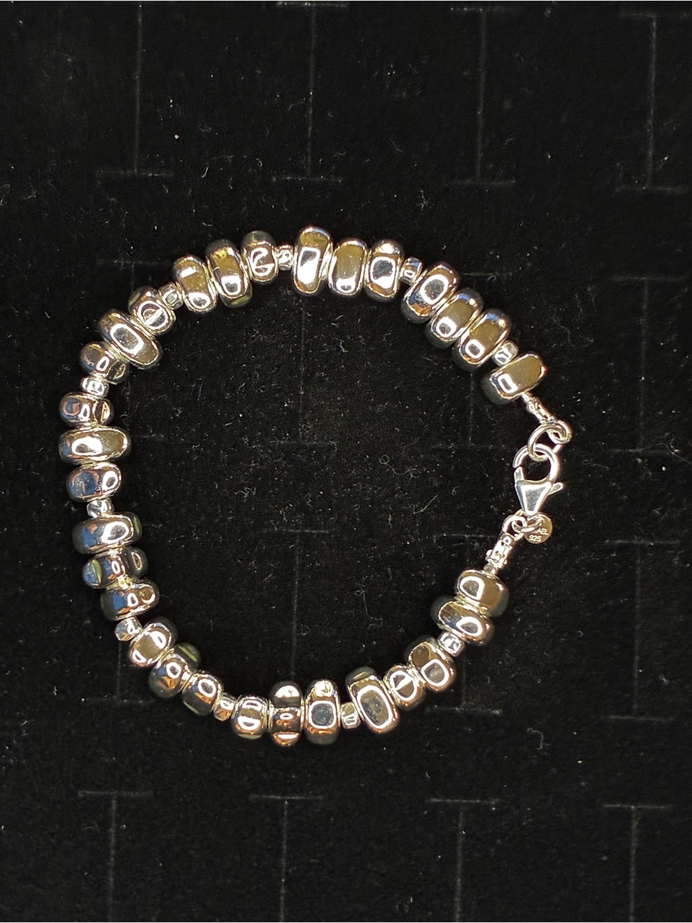 Silpada’s Sterling Silver Bracelet add plenty of shine & texture to your stack.
